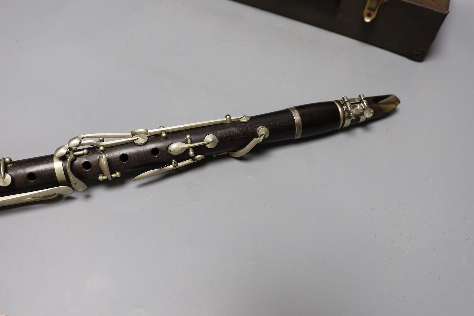 A ‘Superior Class’ Hawkes & Son clarinet and a cased Rampone and Cazzani ‘Judson’ ’ clarinet, 67 cm long.